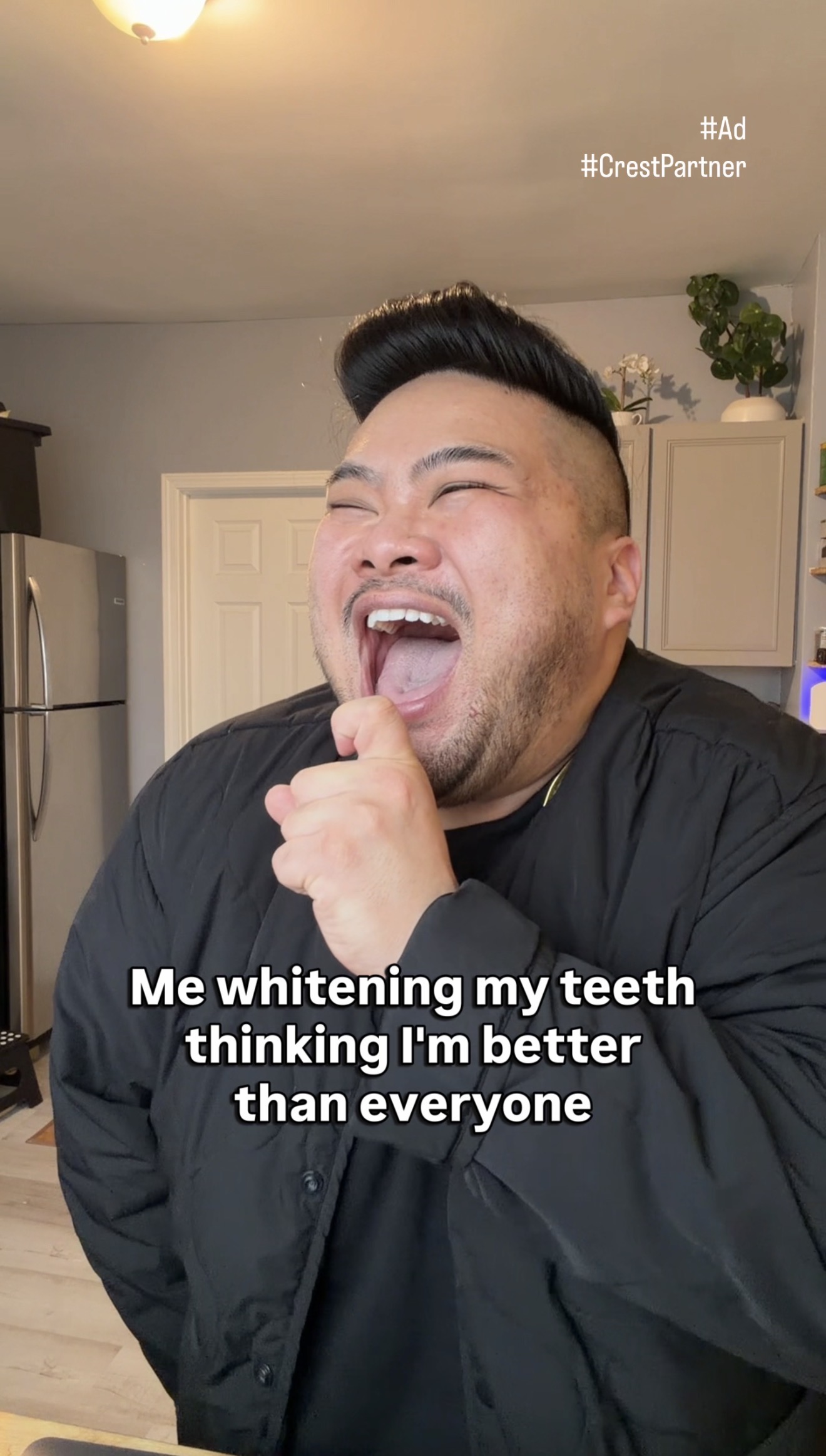 I laugh with one hand under my chin while text says that whitening my teeth makes me think I am better than everyone.