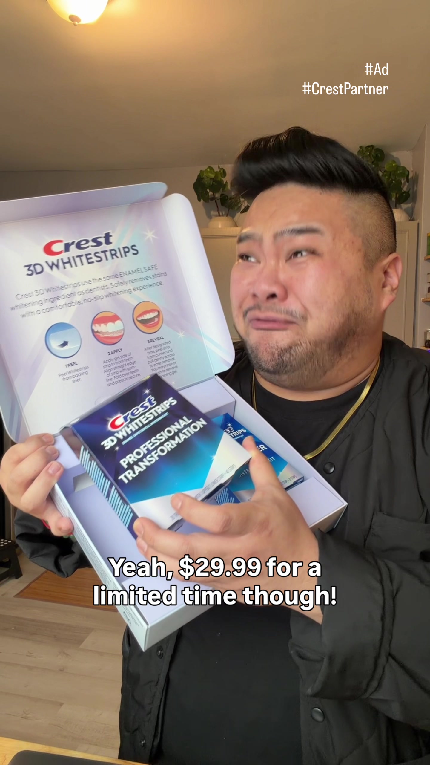I hold an open Crest 3DWhitestrips combo pack toward the camera during the paid partnership video.